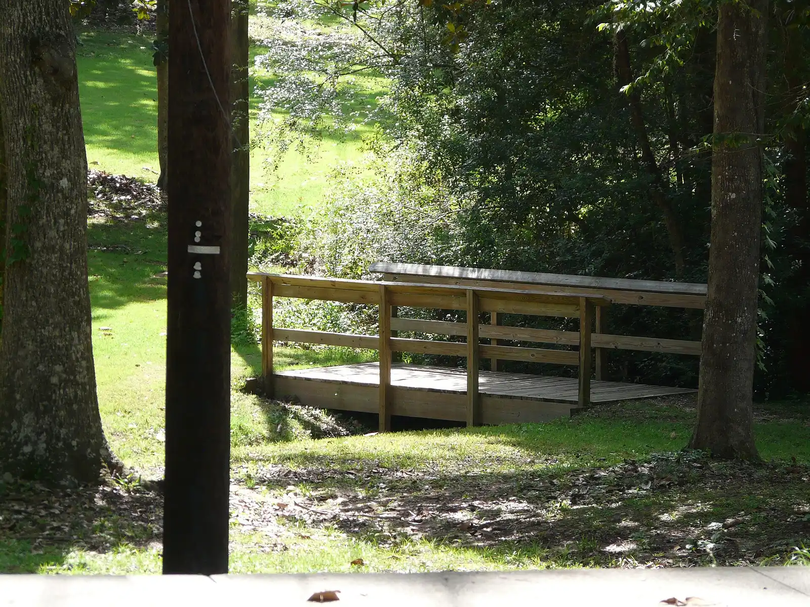 A wooden footbridge over a creek in Myers Park, Tallahassee, home of the city's annual Easter egg hunt.