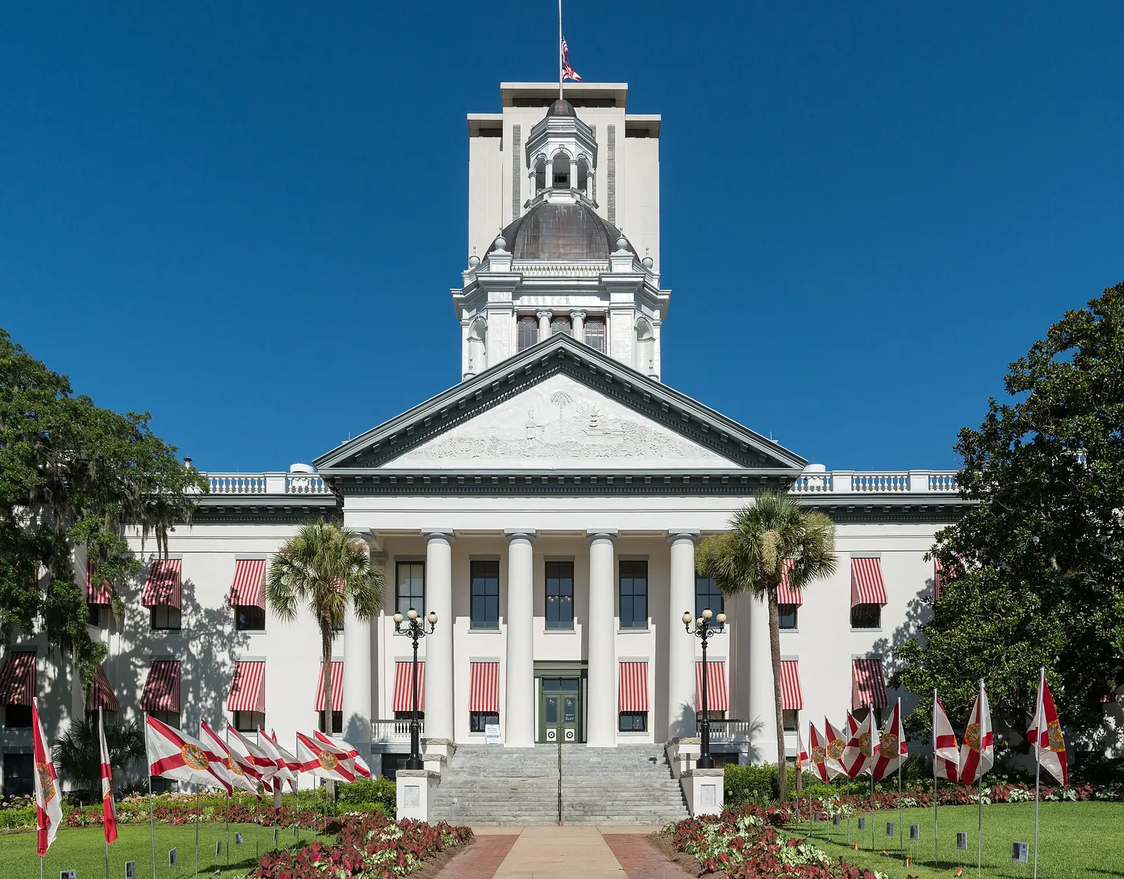The east front of Florida's Historic Capitol, now a free museum, with the modern Capitol tower behind it in downtown Tallahassee.