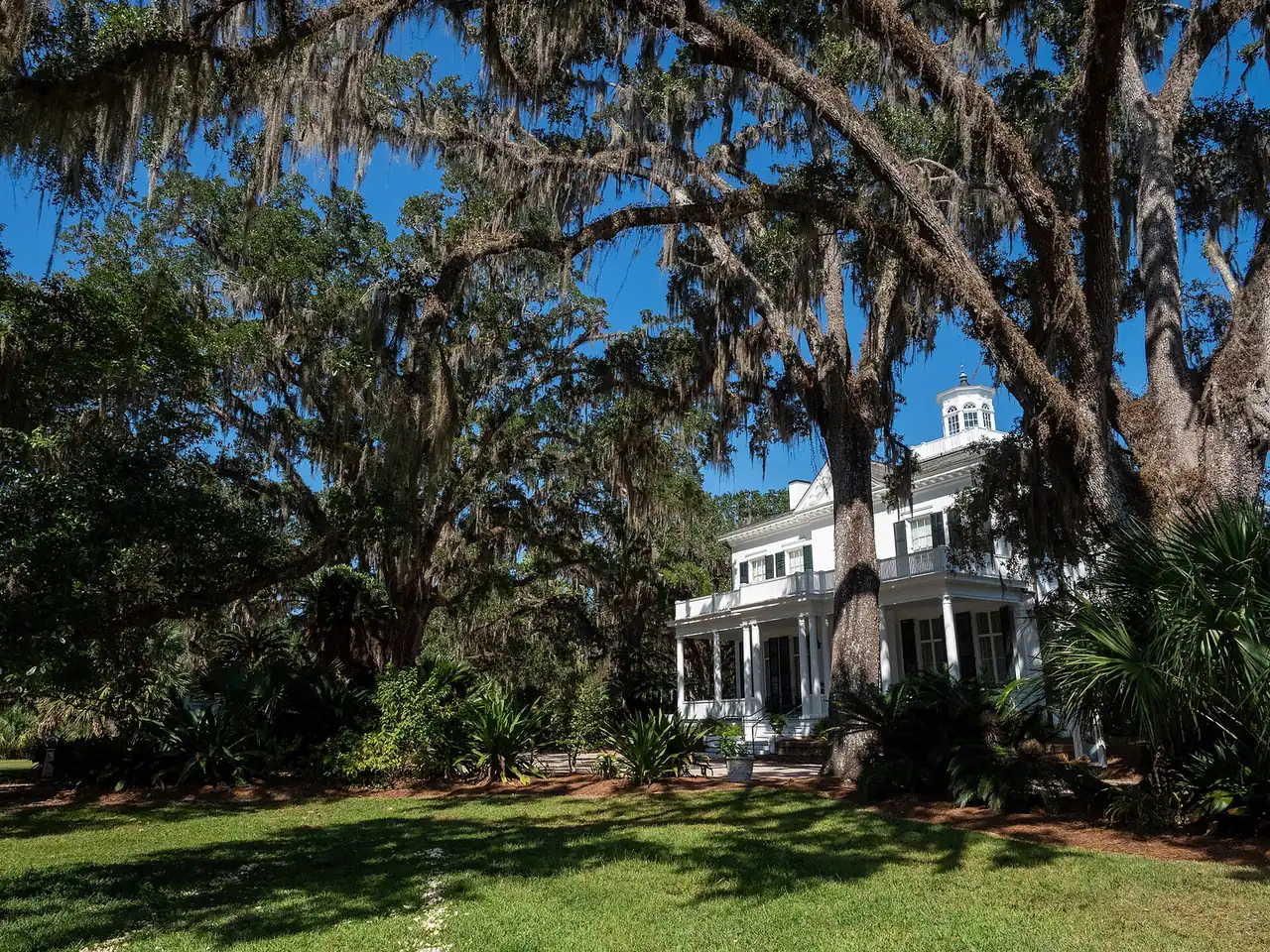 The Goodwood Museum and Gardens main house under live oaks on Miccosukee Road in Tallahassee, where the museum holds its Halloween events on the front lawn.