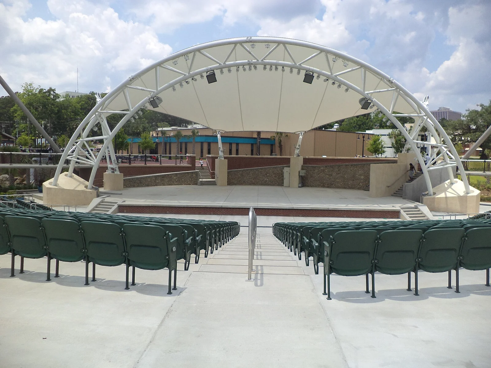 The canopied stage and seating of the Adderley Amphitheater, formerly the Capital City Amphitheater, in Cascades Park, Tallahassee.