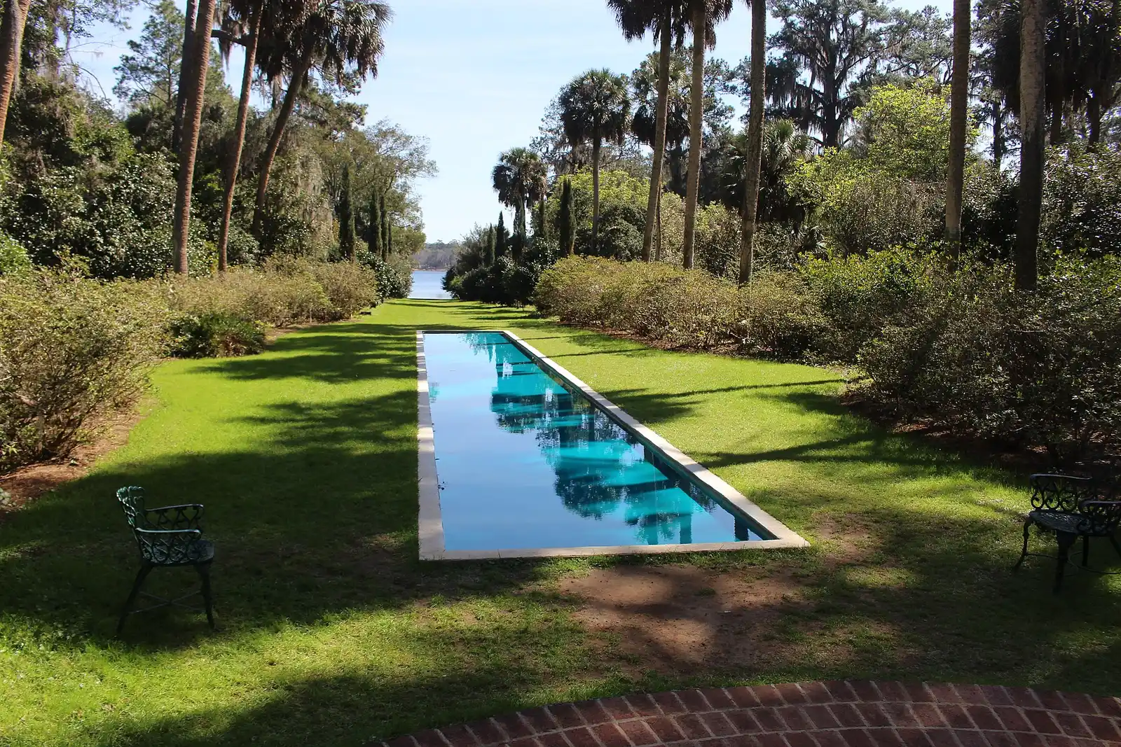 The reflection pool at Alfred B. Maclay Gardens State Park on Thomasville Road in Tallahassee, looking toward Lake Hall.